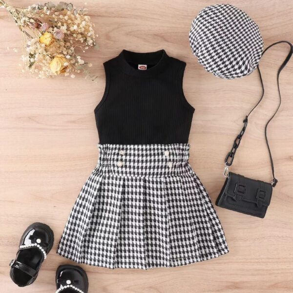 Checked skirt and black top